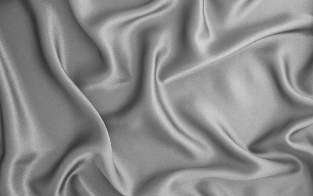 Wrinkled gray silk fabric.